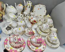 A GROUP OF TEA AND COFFEE WARES, including a Paragon part tea set (four cups, cream jug, sugar