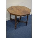 AN EDWARDIAN ROSEWOOD OCTAGONAL CENTRE TABLE on turned legs united by a cross stretcher with
