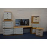 A STAG OAK AND WHITE THREE PIECE BEDROOM SUITE comprising a dressing table with a long rectangular