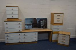 A STAG OAK AND WHITE THREE PIECE BEDROOM SUITE comprising a dressing table with a long rectangular