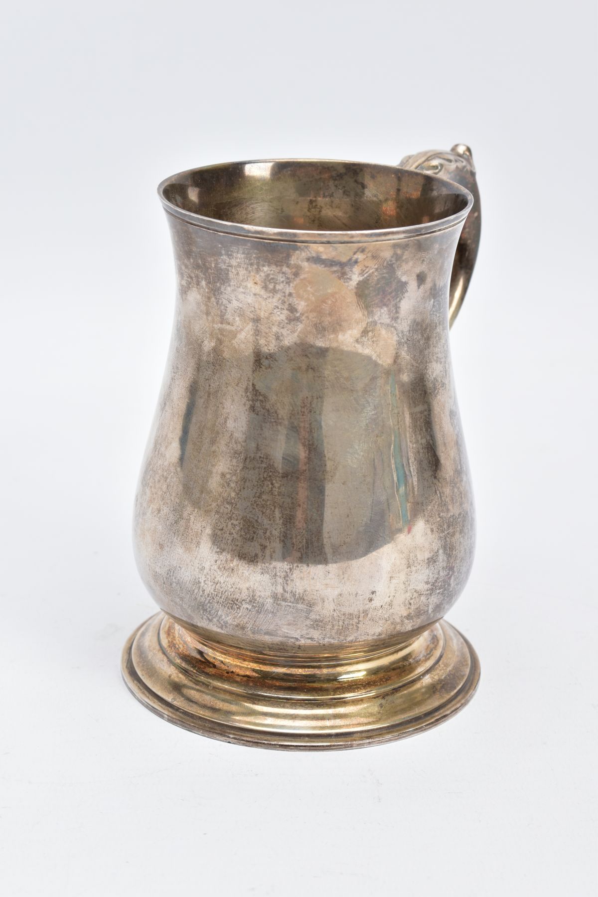 A SILVER TANKARD, of a plain polished design, bell shaped body on a circular base with a foliate - Image 4 of 6
