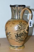 A DOULTON LAMBETH HANNAH BARLOW BALUSTER SHAPED STONEWARE JUG, with a hallmarked silver rim,