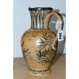 A DOULTON LAMBETH HANNAH BARLOW BALUSTER SHAPED STONEWARE JUG, with a hallmarked silver rim,