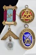 A MASONIC MEDAL AND TWO MASONIC PENDANTS, the gilt metal and silver gilt medal, fitted on a burgundy