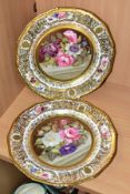 A PAIR OF STEVENS & HANCOCK PORCELAIN CABINET PLATES, the border with gilt decoration and three