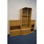 A MODERN LIGHT OAK GLAZED TWO DOOR DISPLAY CABINET with canted front corners three glass shelves