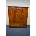 A VICTORIAN FLAME MAHOGANY TRIPLE PANELLED DOOR WARDROBE above four long drawers width 198cm x depth
