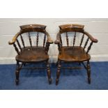 A PAIR OF STAINED OAK CAPTAINS CHAIRS