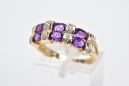 A 9CT GOLD AMETHYST AND DIAMOND HALF HOOP RING, designed with three columns each set with two oval