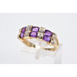 A 9CT GOLD AMETHYST AND DIAMOND HALF HOOP RING, designed with three columns each set with two oval