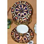 A SET OF SIX ROYAL CROWN DERBY IMARI 1128 SAUCERS AND A CUP, printed and impressed marks, all