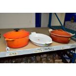 LE CREUSET KITCHEN WARES, comprising number 24 and 26 casserole dishes with lids and a number 32