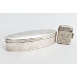 A SILVER VESTA AND BOX, the vesta decorated with an engraved foliate design and vacant cartouche and