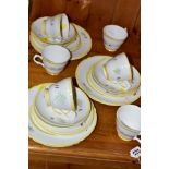 A SHELLEY ART DECO PART TEASET, comprising six teacups, six side plates and six 21.5cm plates, green