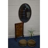 AN ART NOUVEAU OVAL COPPER BEVELLED EDGE WALL MIRROR together with a pair of 19th century circular