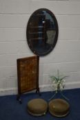 AN ART NOUVEAU OVAL COPPER BEVELLED EDGE WALL MIRROR together with a pair of 19th century circular