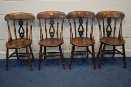 A SET OF FOUR EARLY 20TH CENTURY ELM AND BEECH CIRCULAR SEATED KITCHEN CHAIRS