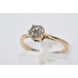 A 9CT GOLD DIAMOND CLUSTER RING, designed with a smaller cluster of seven brilliant cut diamonds,