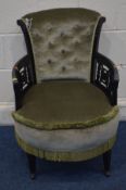 A LATE 19TH CENTURY EBONISED CIRCULAR ELBOW CHAIR with fretwork armrests on square tapering front