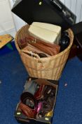 A WICKER BASKET CONTAINING, a Michael Kors branded handbag, vintage vanity case, leather messenger