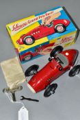 A BOXED SCHUCO GRAND PRIX RACER, No 1070, red body with white racing number 2, silver hubs, black