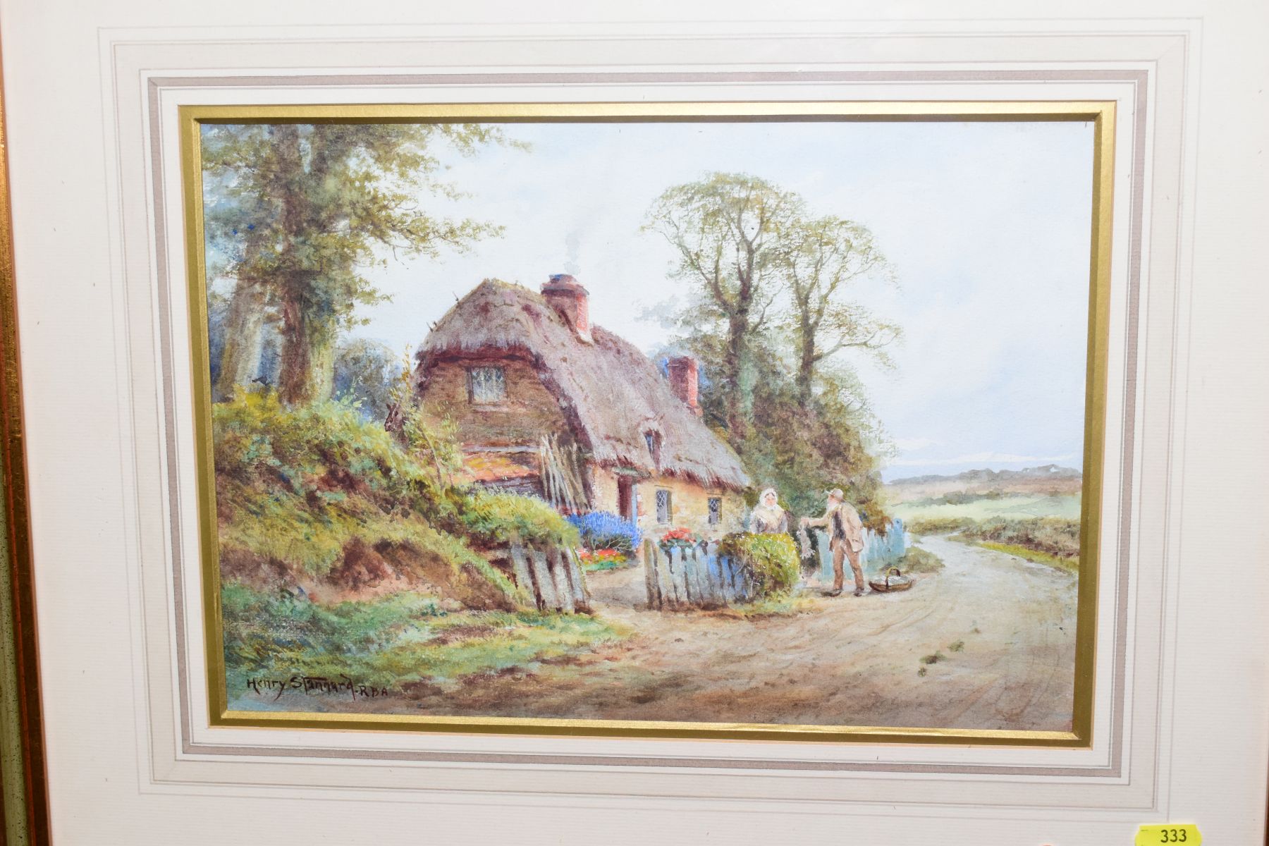 HENRY STANNARD R.B.A (1844-1920), a thatched cottage in a rural setting, with an elderly couple - Image 4 of 5