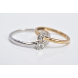 TWO SINGLE STONE DIAMOND RINGS, the first a 9ct white gold ring set with a round brilliant cut