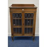 AN EARLY TO MID 20TH CENTURY OAK LEAD GLAZED TWO DOOR CHINA CABINET width 87cm x depth 39cm x height