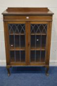 AN EARLY TO MID 20TH CENTURY OAK LEAD GLAZED TWO DOOR CHINA CABINET width 87cm x depth 39cm x height