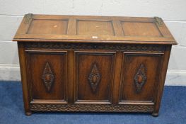 AN OAK TRIPLE PANEL BLANKET CHEST with brass hinges width 108cm x depth 44cm x height 67cm
