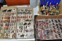 A QUANTITY OF ASSORTED HOLLOWCAST AND PLASTIC SOLDIER FIGURES, to include a quantity of Britains and