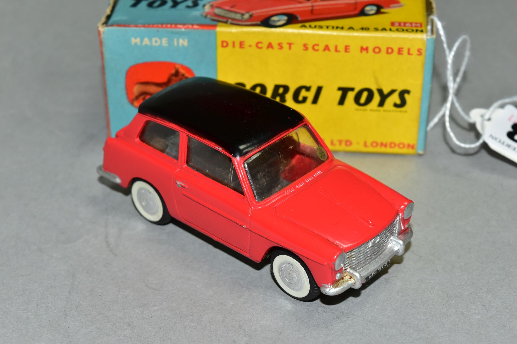 A BOXED CORGI TOYS AUSTIN A40, No 216M, red body with black roof, flat spun hubs with self- - Image 2 of 4