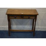 A REPRODUCTION OAK SIDE TABLE with two drawers width 76cm x depth 31cm x height 69cm