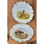 A PAIR OF ROYAL CROWN DERBY WAVY RIM CABINET PLATES, printed and tinted designs, one with huntsmen