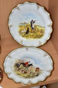 A PAIR OF ROYAL CROWN DERBY WAVY RIM CABINET PLATES, printed and tinted designs, one with huntsmen