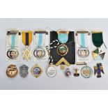 AN ASSORTMENT OF MASONIC RELATED ITEMS, to include six medals on ribbons, a white enamel St.Leger