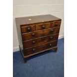 A GEORGIAN MAHOGANY AND CROSSBANDED CHEST OF THREE SHORT OVER THREE LONG DRAWERS on bracket feet