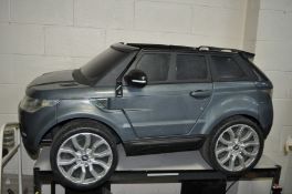 AN ELECTRIC RANGE ROVER TOY CAR 145cm long (PAT fail due to joined cable but charges and working)