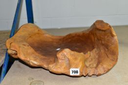 A TEAK WOOD CIRCULAR RUSTIC FRUIT BOWL, approximate height 15cm x diameter 50cm