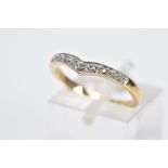 A 9CT GOLD DIAMOND RING, in the form of a wishbone, set with a row of five single cut diamonds,