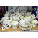 A ROYAL ALBERT 'QUEEN'S MESSENGER' PATTERN TEA SET AND A DUCHESS 'GREENSLEEVES' PATTERN TEA SET, the