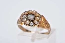 A VICTORIAN MOURNING RING, the yellow metal ring designed with a central rectangular glass panel