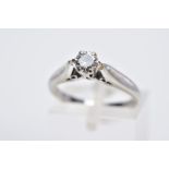AN 18CT WHITE GOLD SINGLE STONE DIAMOND RING, designed with a claw set round brilliant cut diamond