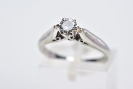 AN 18CT WHITE GOLD SINGLE STONE DIAMOND RING, designed with a claw set round brilliant cut diamond