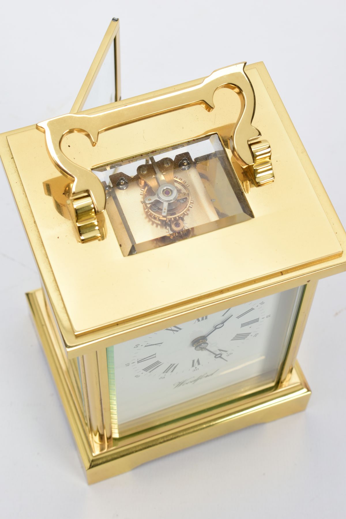 A WOODFORD ENGLISH BRASS STRIKING CARRIAGE CLOCK, white dial with Brequet style hands, Roman - Image 5 of 6