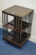 AN EDWARDIAN MAHOGANY TWO TIER REVOLVING BOOKCASE 47cm squared x height 80cm