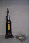 A SEBO AUTOMATIC X4 VACUUM CLEANER ( PAT pass and working but needs new filter and bag) and a bag of