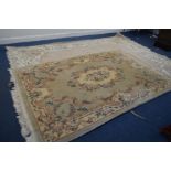 A WOOLLEN CHINESE CREAM CARPET SQUARE 360cm x 278cm together with a smaller similar carpet square