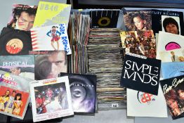 A TRAY CONTAINING OVER TWO HUNDRED AND FIFTY 7'' SINGLES from the 1980's including The Cult, The