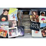 A TRAY CONTAINING OVER TWO HUNDRED AND FIFTY 7'' SINGLES from the 1980's including The Cult, The